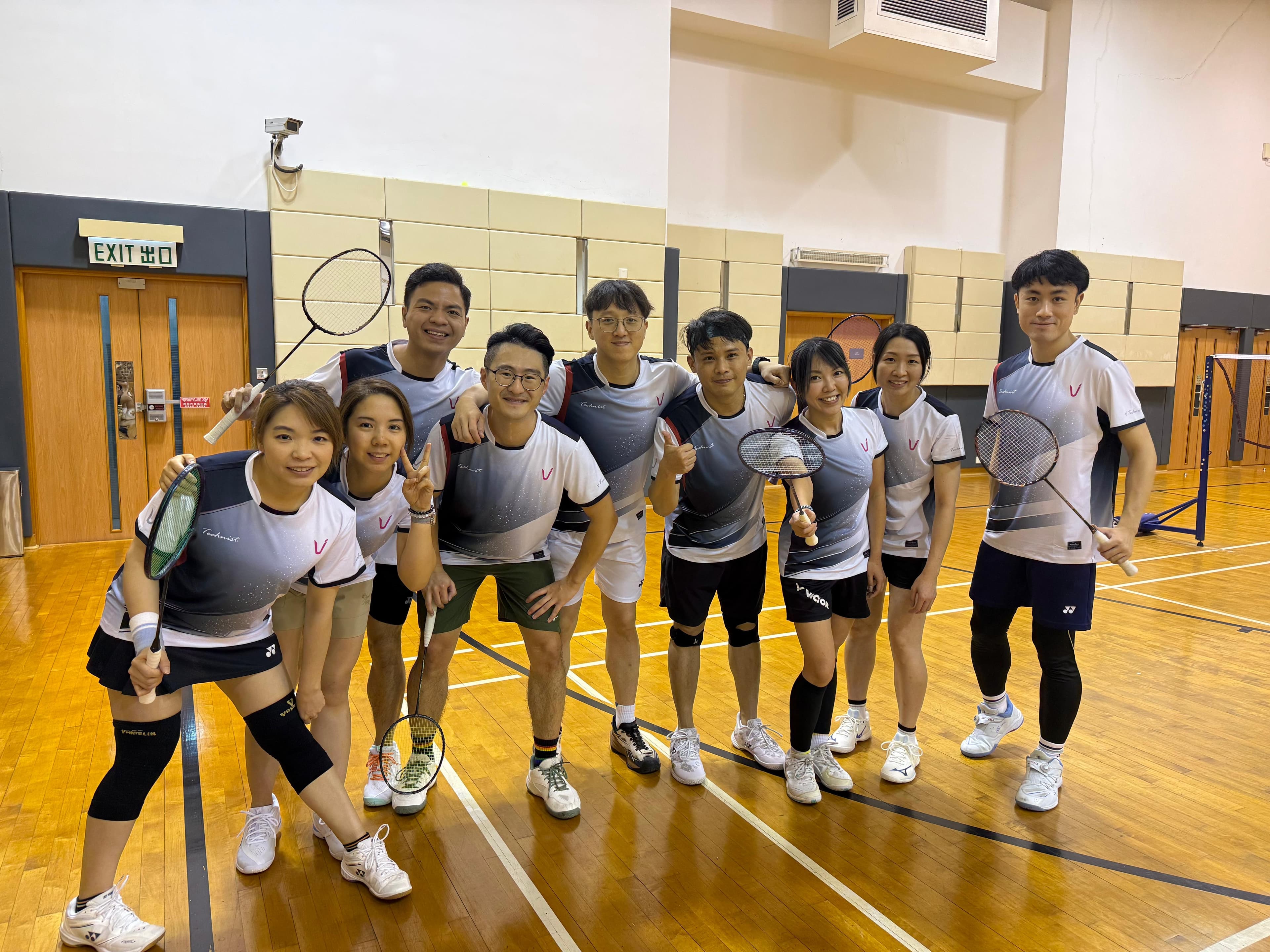Indoor badminton team photo after their Wan Chai session