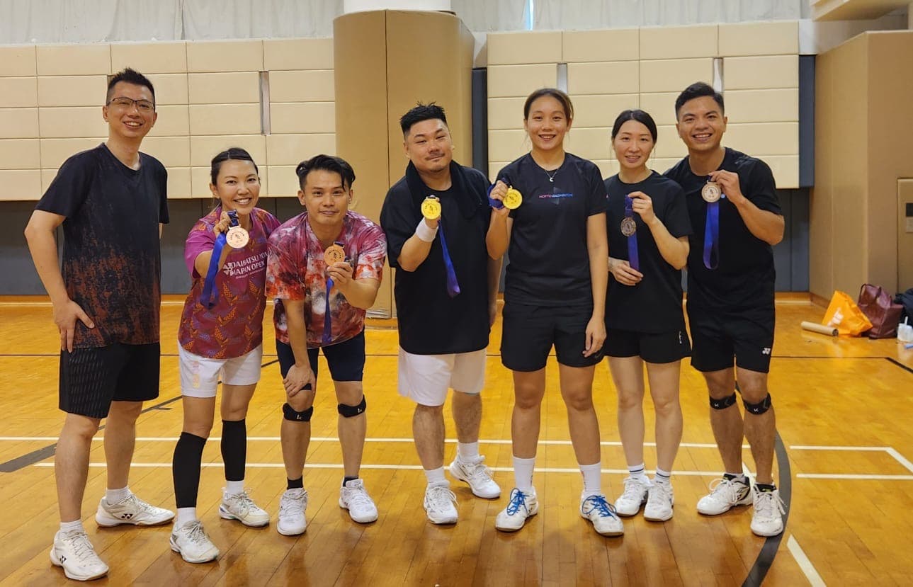 SportsMatch community members posing with their medals